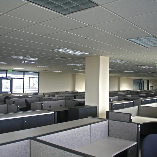 Photo across the tops of empty cubicles at Tower Place